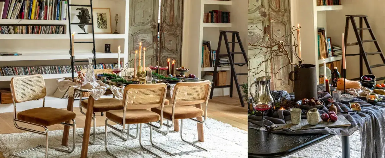 Ambiance chaleureuse pour aménager salle à manger : chaises cannées, table dressée avec bougies, fruits et feuillage.