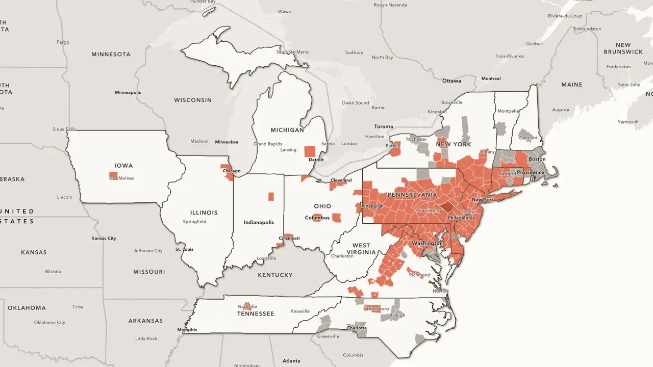 Map showing the spread of a spotted lanternfly infestation across the northeastern United States, with red areas indicating affected regions.