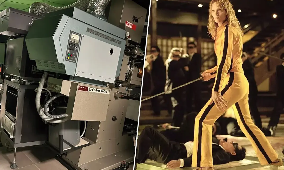Proyector de cine 70 mm junto a una escena de "Kill Bill" con Uma Thurman.