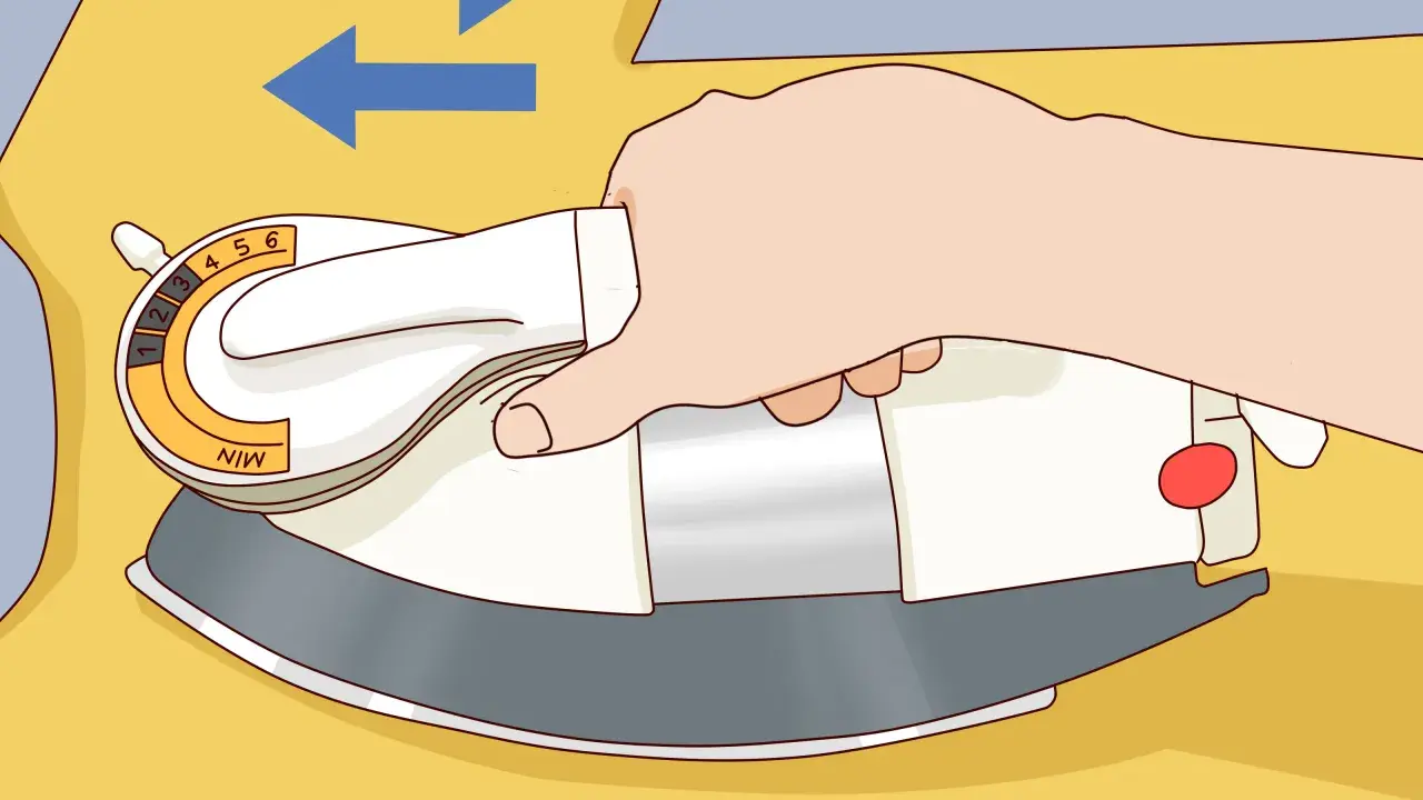 Plancha ropa de poliéster para encogerla sin secadora. Ajusta la temperatura y mueve la plancha.