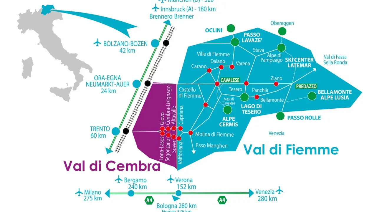 Cartina della Val di Fiemme e Val di Cembra, con i paesi principali, collegamenti stradali e ferroviari, e distanze da città come Trento e Bolzano.