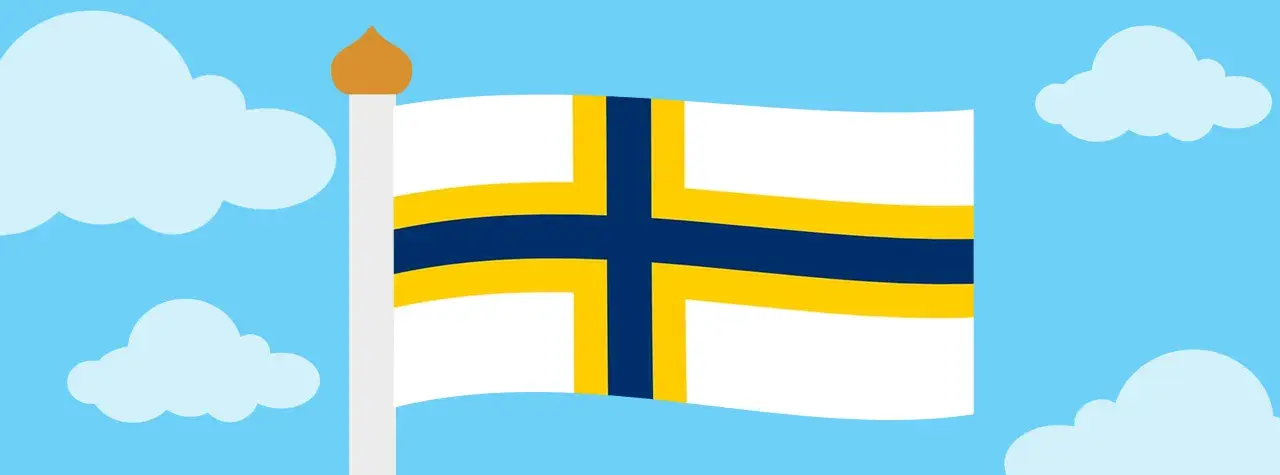 Sverigefinnarnas dag firas med en flagga i blått, gult och vitt som vajar i en klarblå himmel med moln.