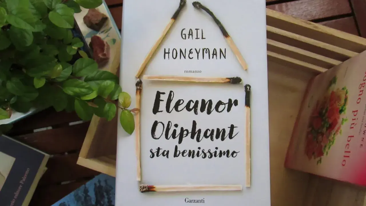 Copertina del libro "Eleanor Oliphant sta benissimo" di Gail Honeyman, con fiammiferi disposti a formare una casa.