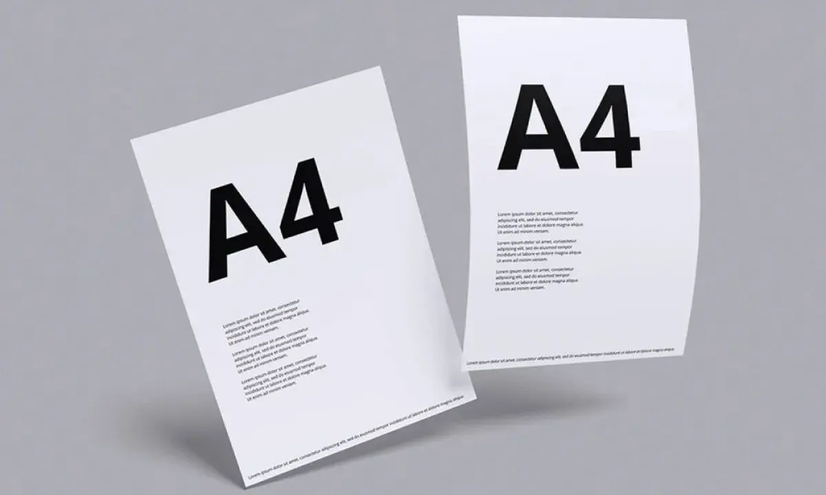 Dwa białe arkusze papieru formatu a9 z czarnym napisem "A4" i tekstem.
