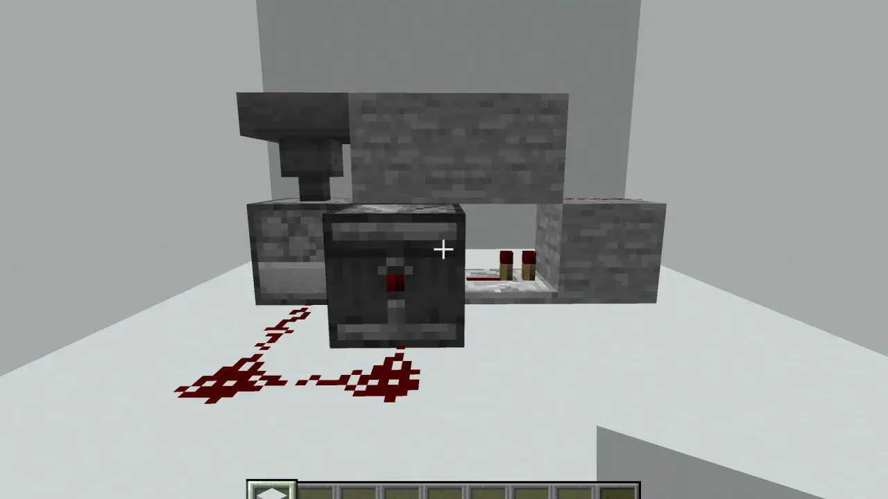 Jak zrobić dispenser w Minecraft: pokazano mechanizm z lejem, dyspenserem i redstone.