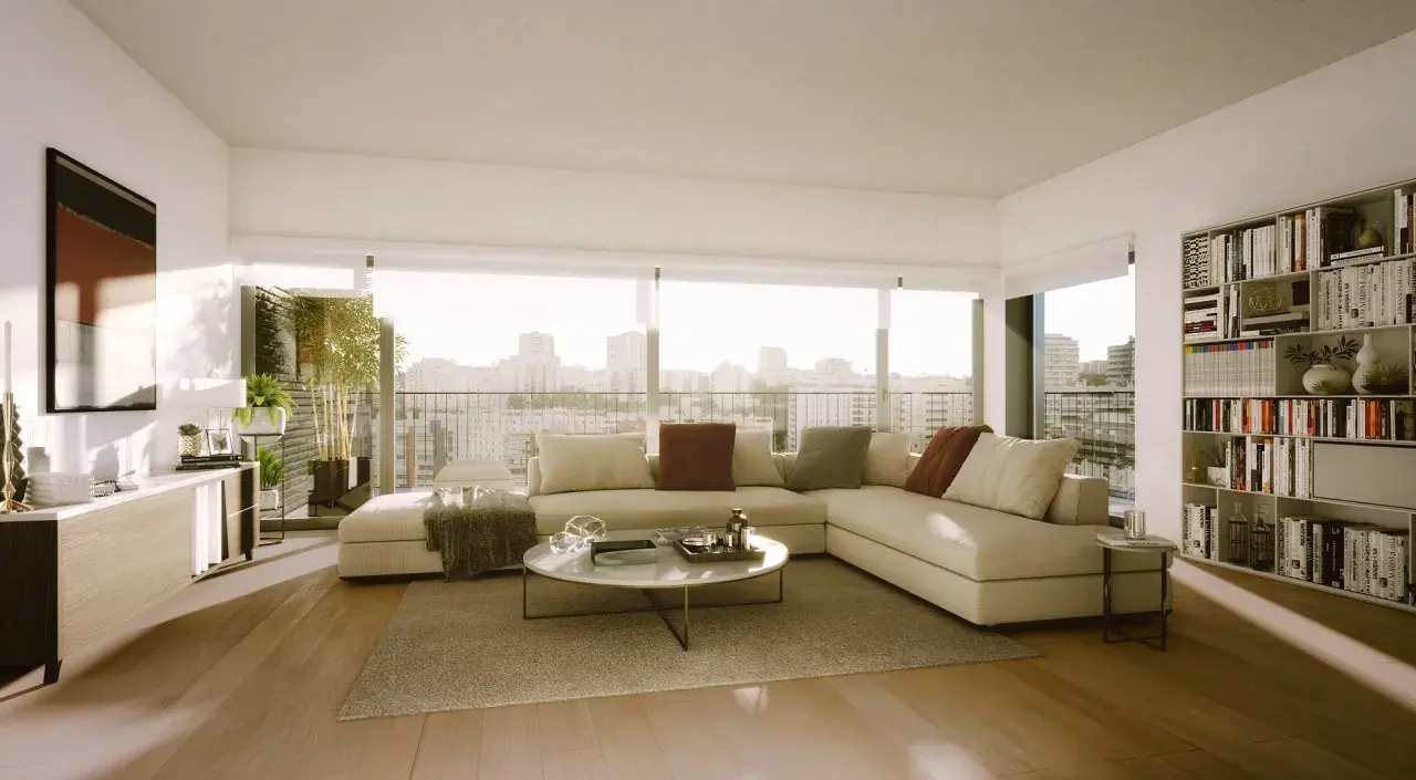 Un salón moderno y luminoso con sofá seccional, mesa de centro, estantería y vistas a la ciudad. ¡Inspírate para diseña tu salón!