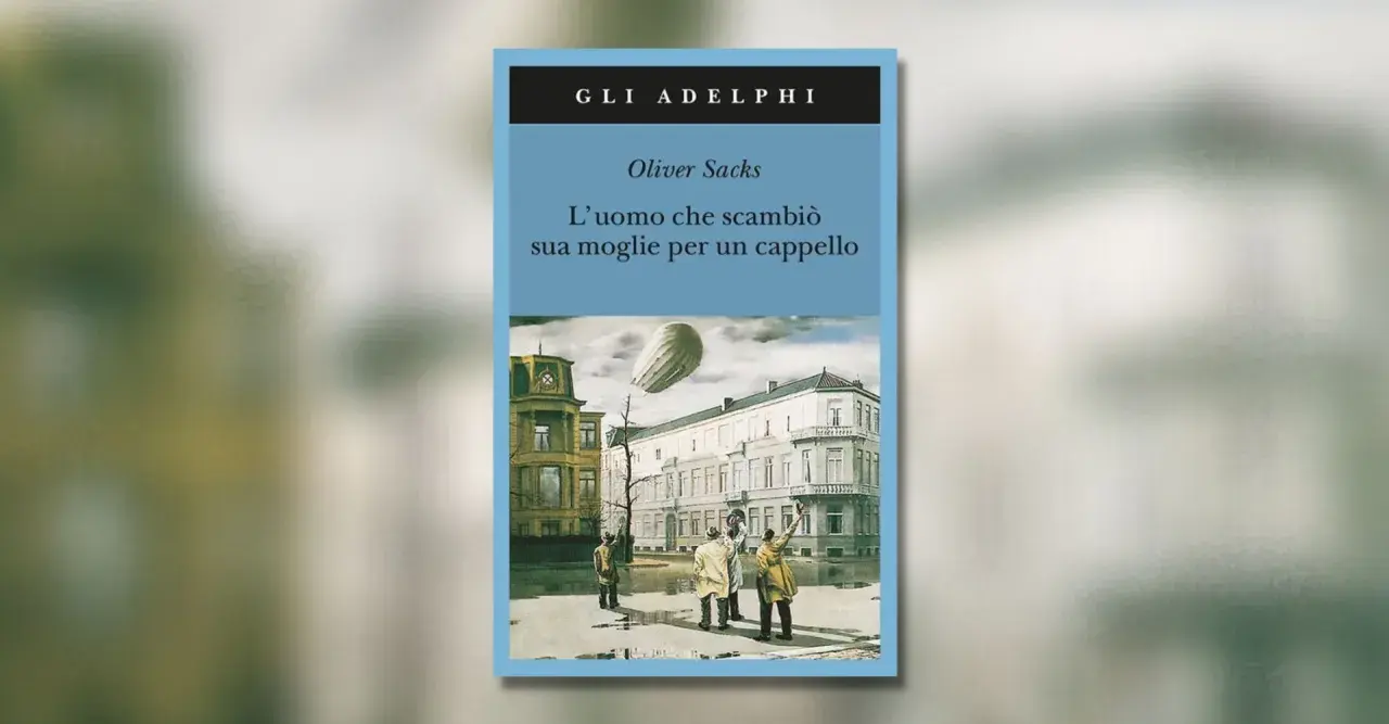 Copertina del libro "L'uomo che scambiò sua moglie per un cappello" di Oliver Sacks. Un'illustrazione surreale con un dirigibile e figure che alzano le mani verso il cielo.