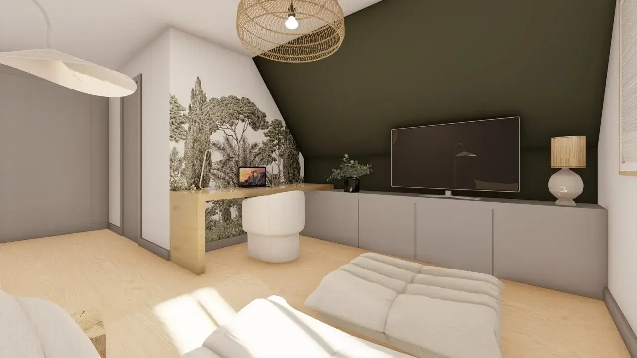 Bureau dans une chambre mansardée d'un coté, avec un mur végétal, une TV et un fauteuil confortable.