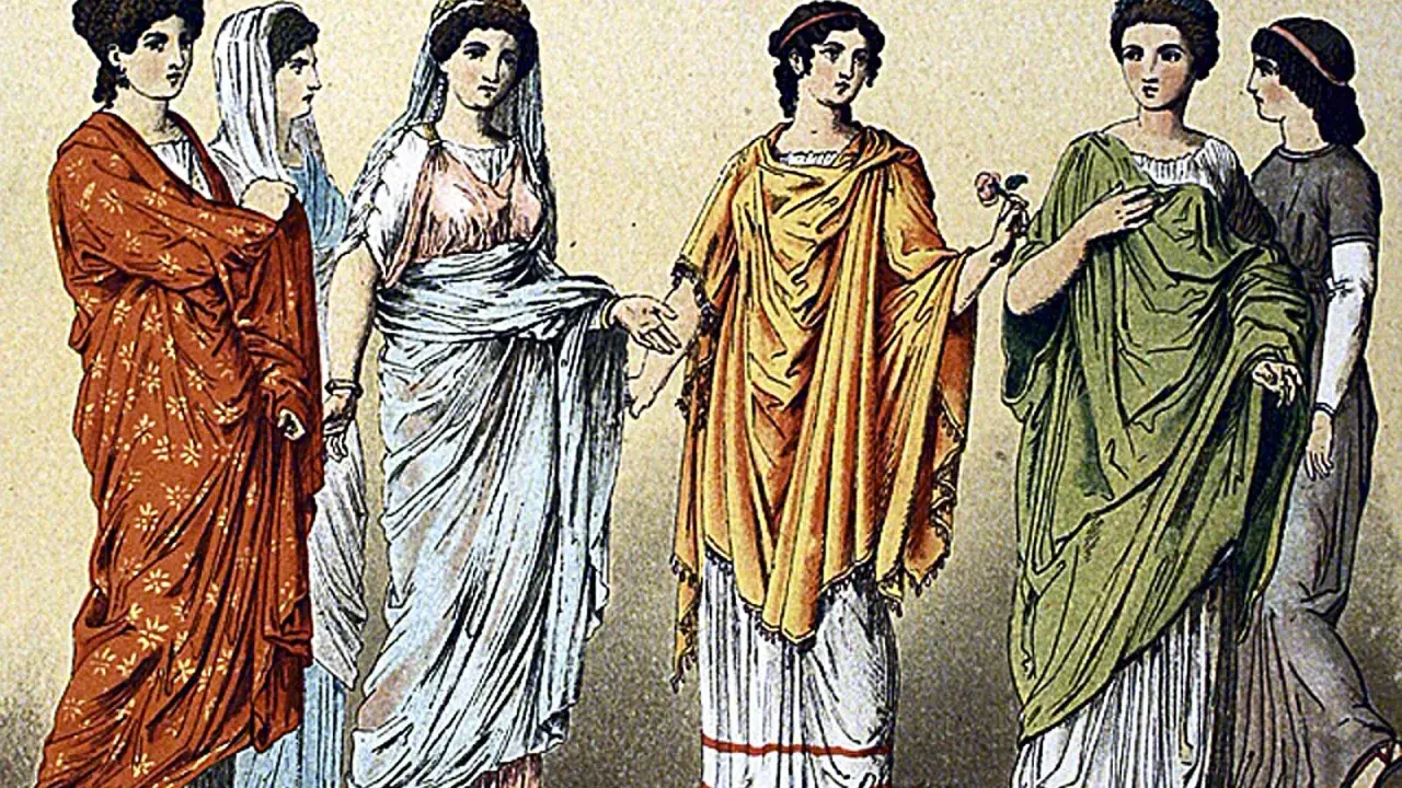 Sechs Frauen in farbenprächtiger Kleidung im alten Rom, von Rot bis Grün, mit kunstvollen Gewändern und Frisuren.