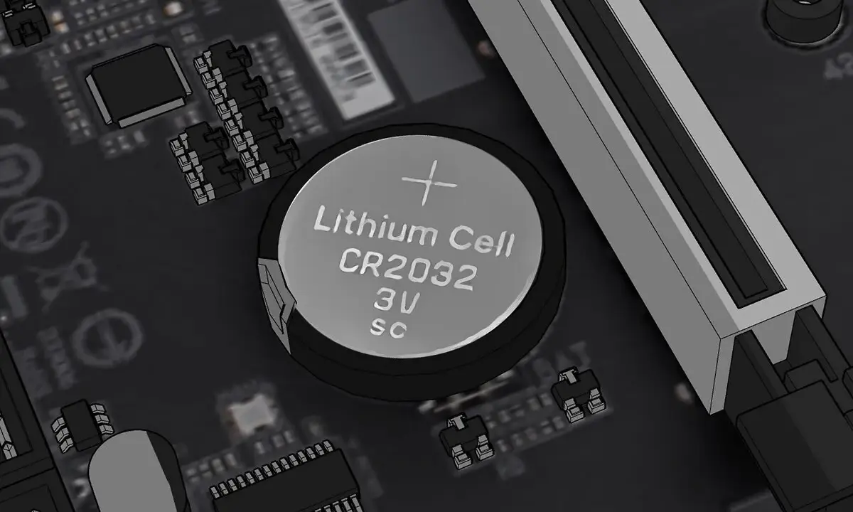 Pile CR2032 sur une carte mère, prête pour un reset BIOS.