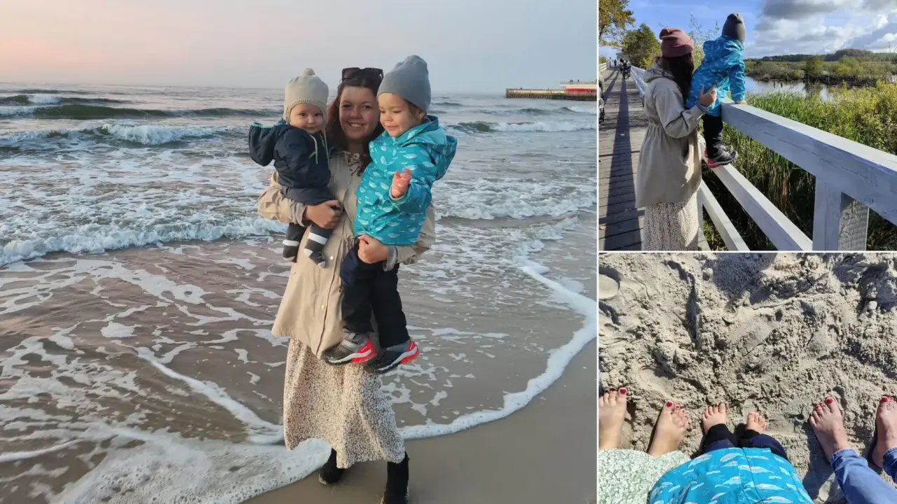 Kobieta z dziećmi na plaży i spacerze w Kołobrzegu.
