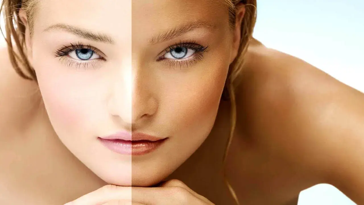Rostro dividido: piel pálida con un cool undertone y piel bronceada. Ojos azules intensos.