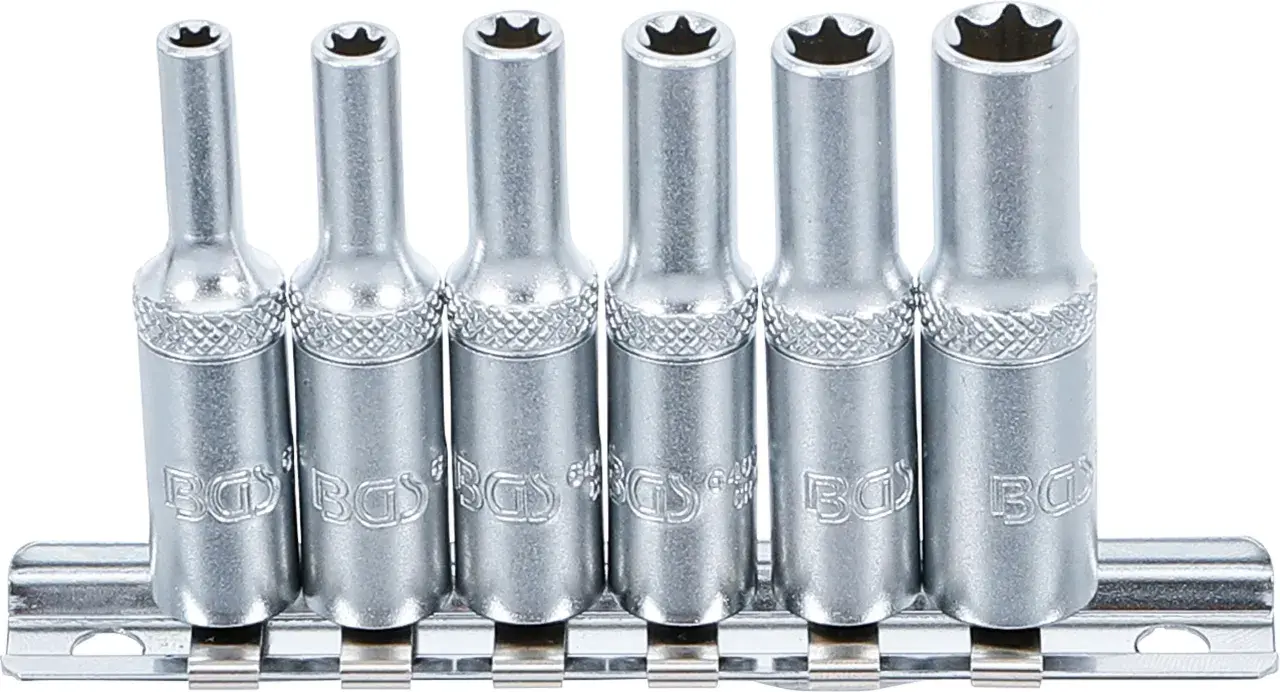 Juego de vasos con puntas de estrella, cada llave torx hembra lista para usar en su carril metálico.