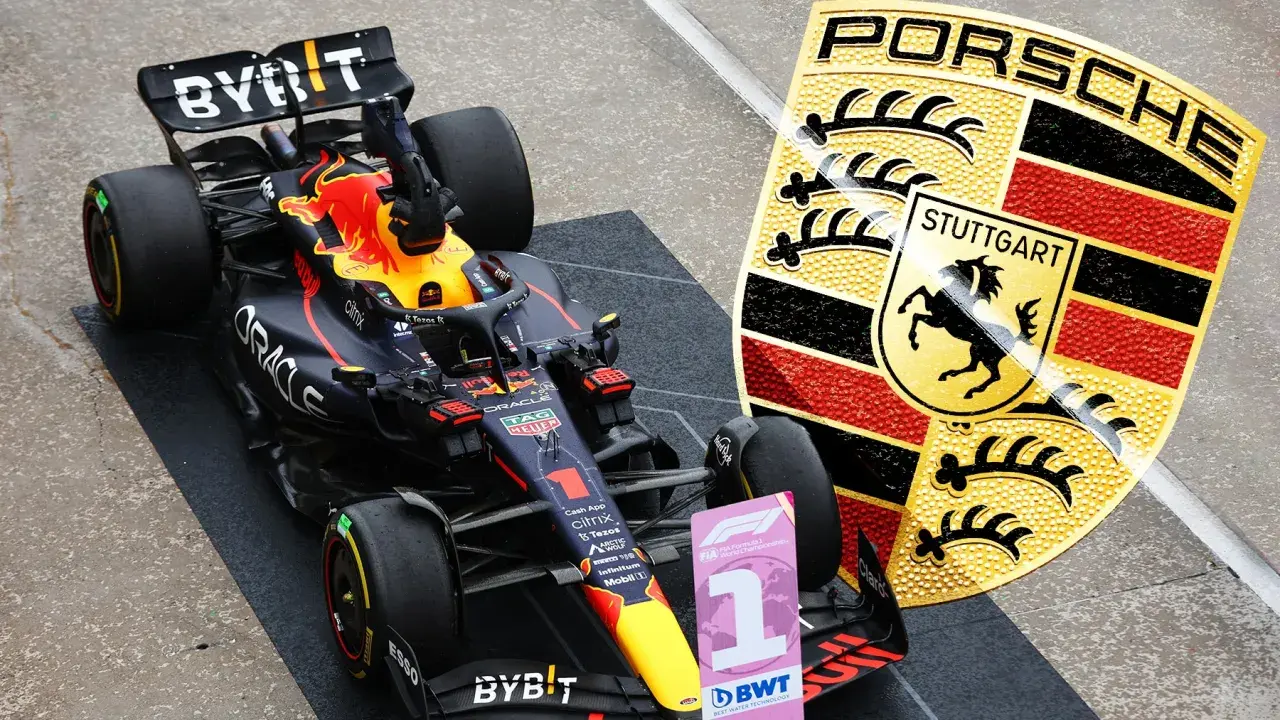 Formel 1 Rennwagen mit Porsche-Logo. Der Wagen trägt die Startnummer 1 und das Porsche-Wappen von Stuttgart.