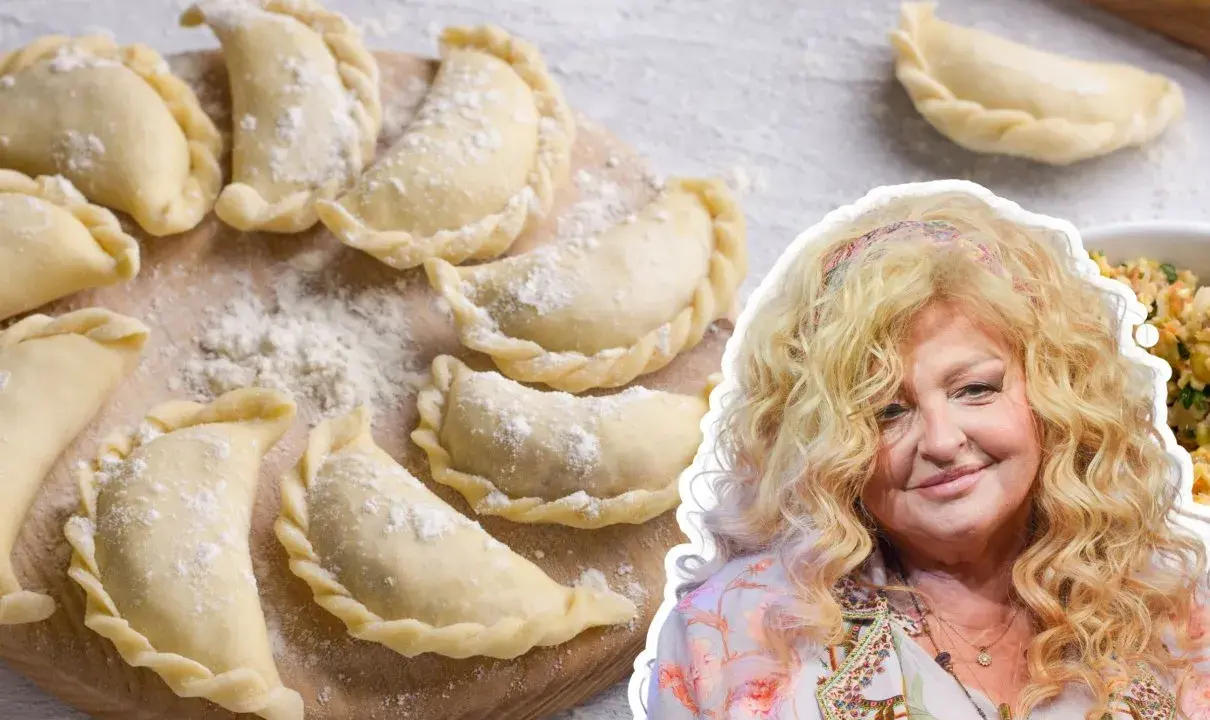 Surowe pierogi na desce, obok Magda Gessler. Idealne ciasto na pierogi według jej przepisu.