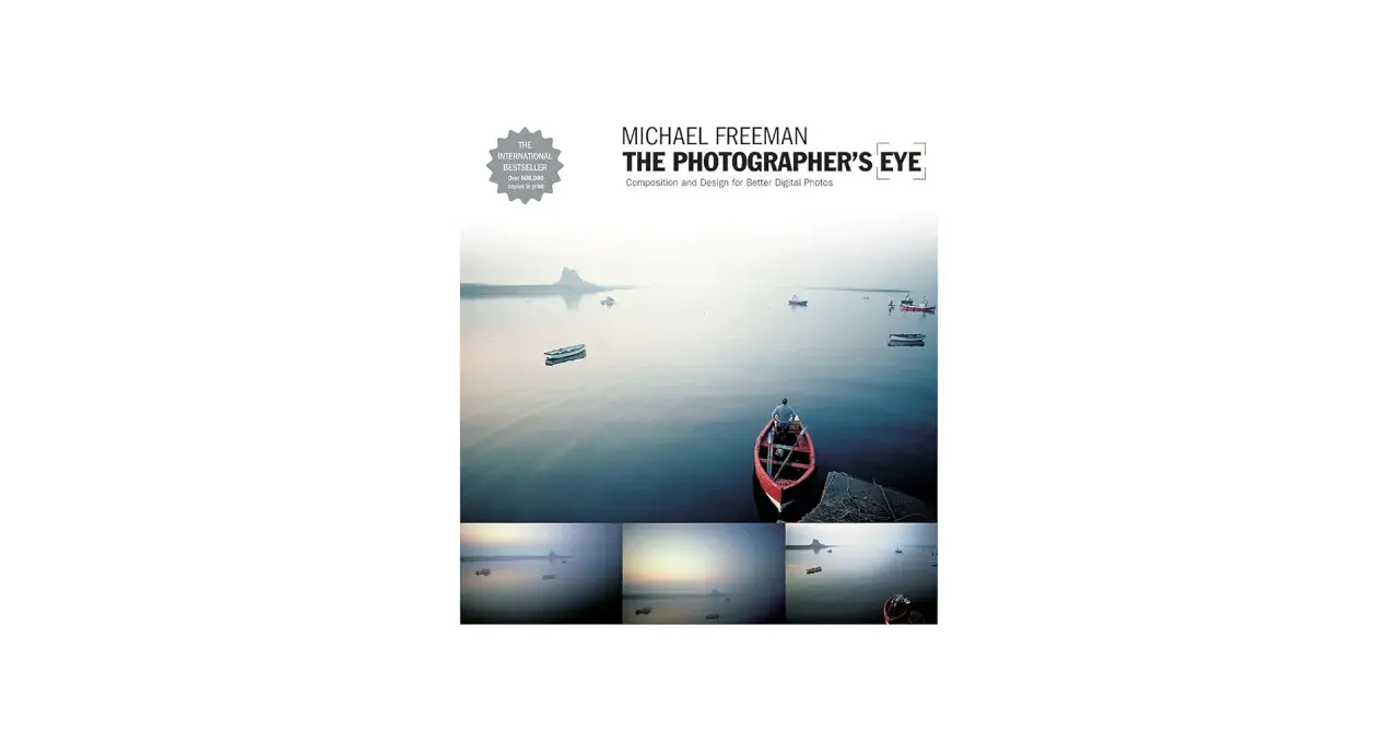 Book cover for "The Photographer's Eye" by Michael Freeman, featuring a serene seascape with boats and a lone figure in a red boat, showcasing the power of a photographer's eye.