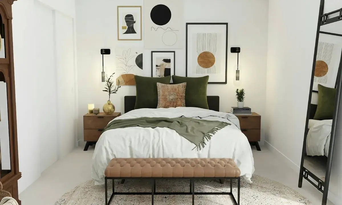 Ideas para decorar una habitación de matrimonio barata: cama con cojines verdes, manta, mesitas de noche de madera, arte abstracto y banco tapizado.