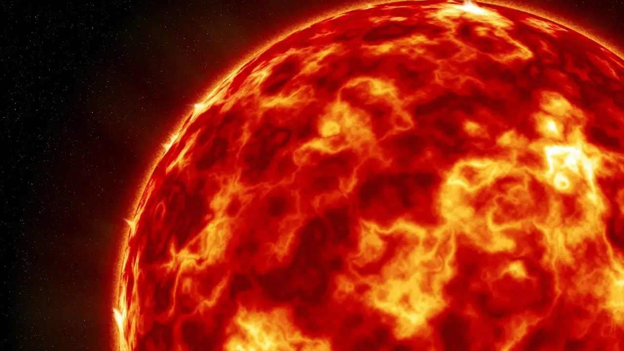 Żarząca się powierzchnia Słońca, z widocznymi plamami i rozbłyskami, zapowiada potężną burzę magnetyczną skutki.