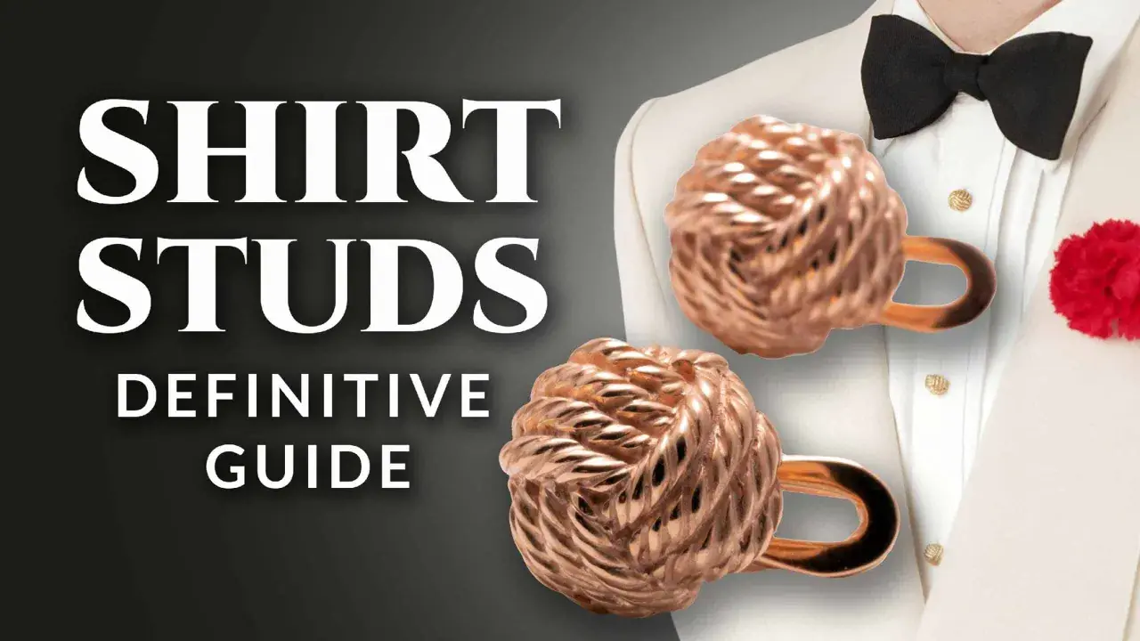 Learn how to wear tuxedo shirt studs with this definitive guide. Features knot-style studs on a formal shirt.