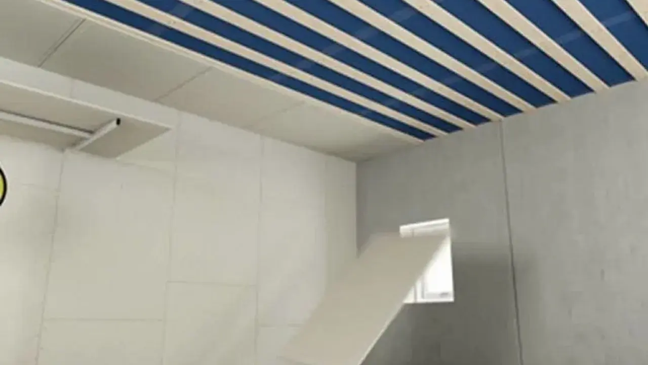 Pose Fermacell plafond : installation de plaques sur une structure en bois et isolant bleu.
