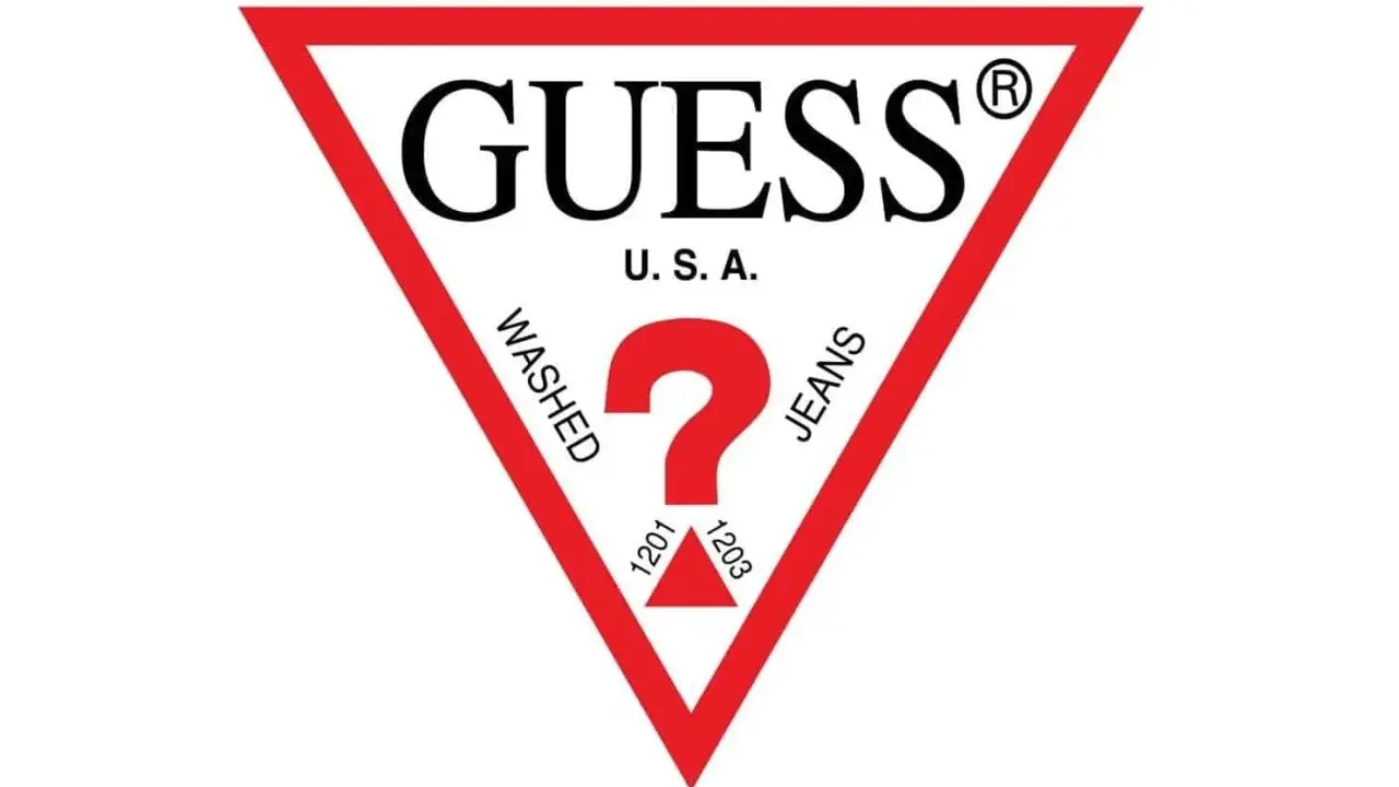Logo Guess, marka premium, z charakterystycznym czerwonym trójkątem i znakiem zapytania.