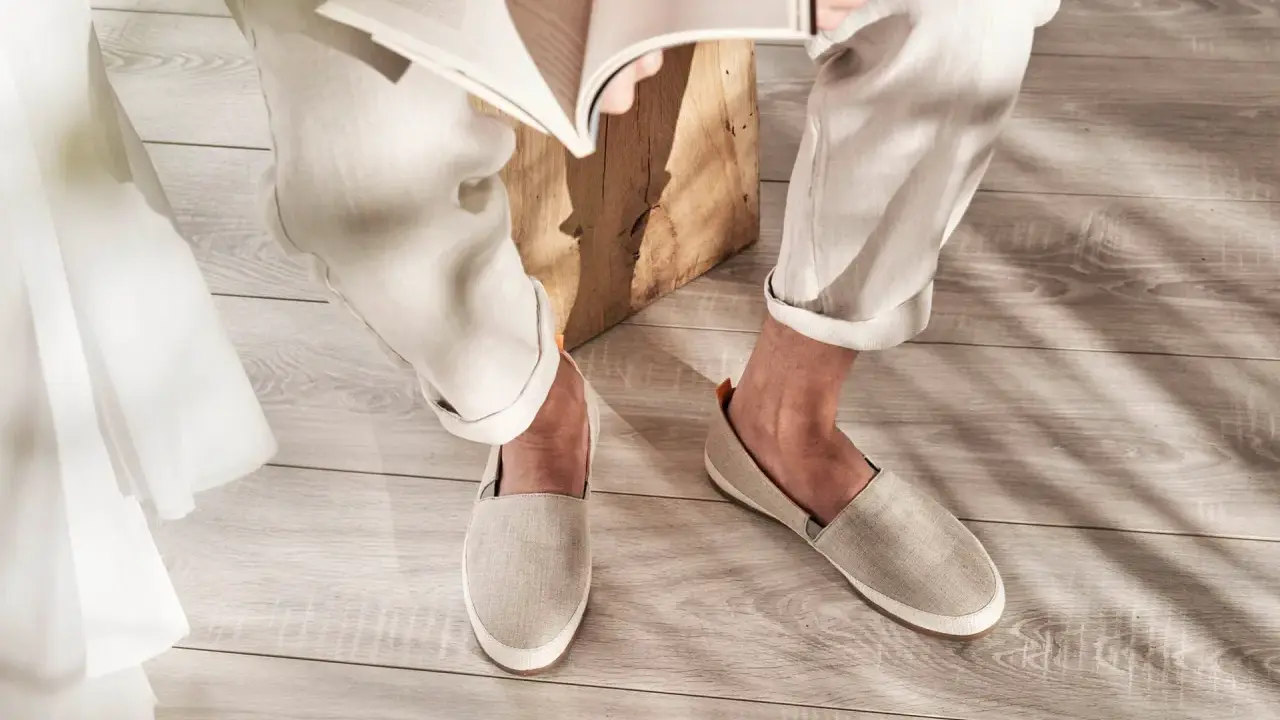 Relaxed linen pants and espadrilles in style, perfect for a casual day reading.