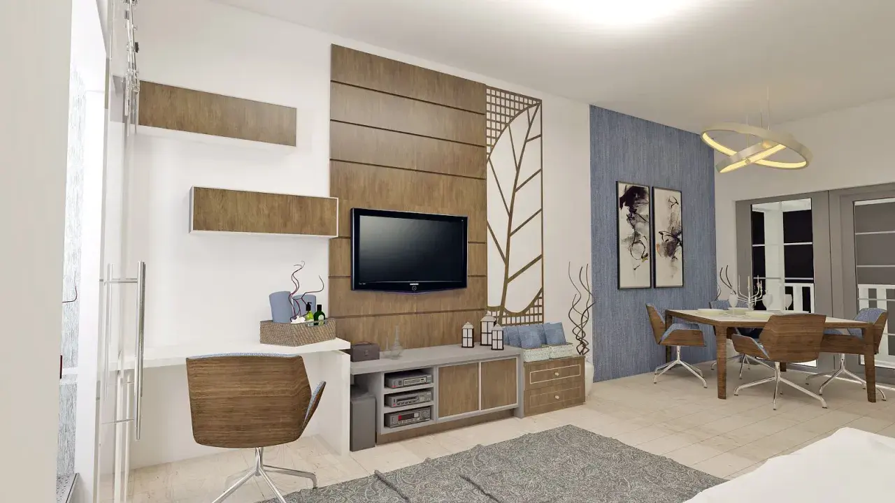 Un soggiorno moderno con scrivania, TV e zona pranzo. Il marrone e il grigio stanno bene insieme, creando un'atmosfera accogliente.