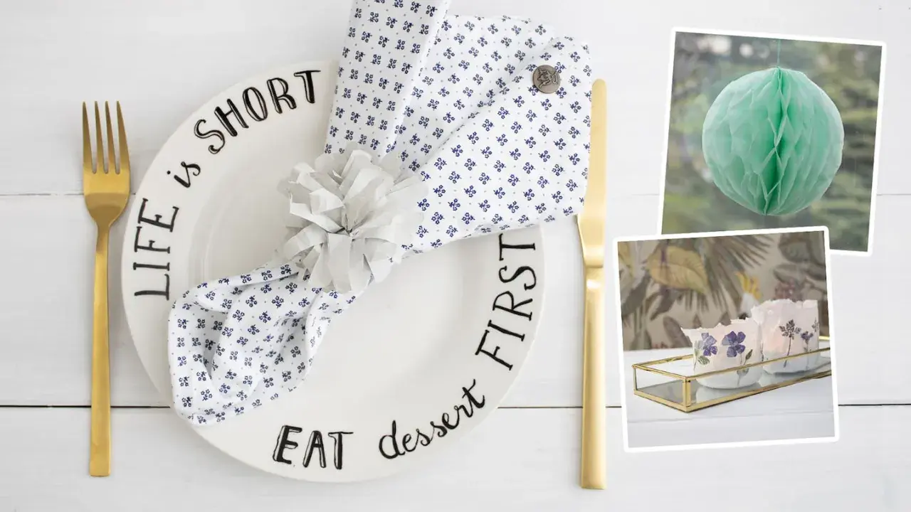Tischdeko mit Teller "Life is short, eat dessert first", Serviettenring und Kerzen. Ideen zum **Wellen basteln** für eine festliche Tafel.