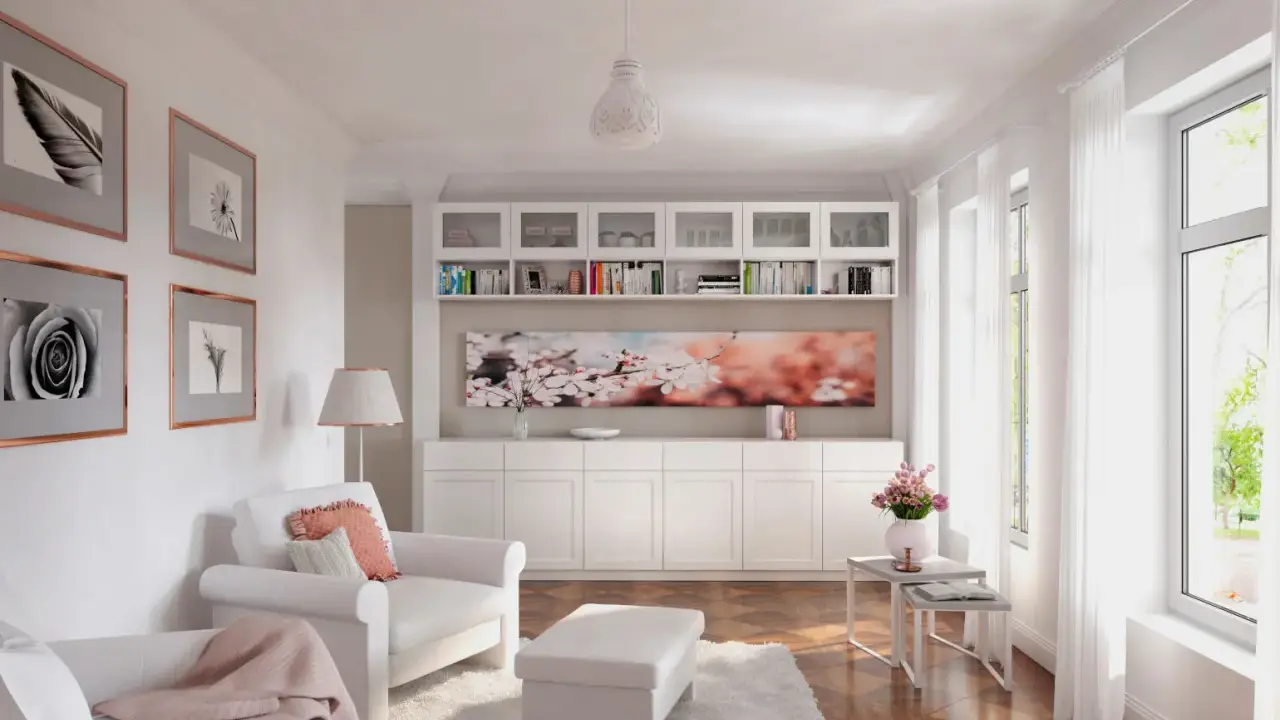 Ein helles Wohnzimmer mit weißem Sofa, Sessel, Bücherregal und Kirschblüten-Kunstwerk. Modernes **interior design** mit viel Licht.
