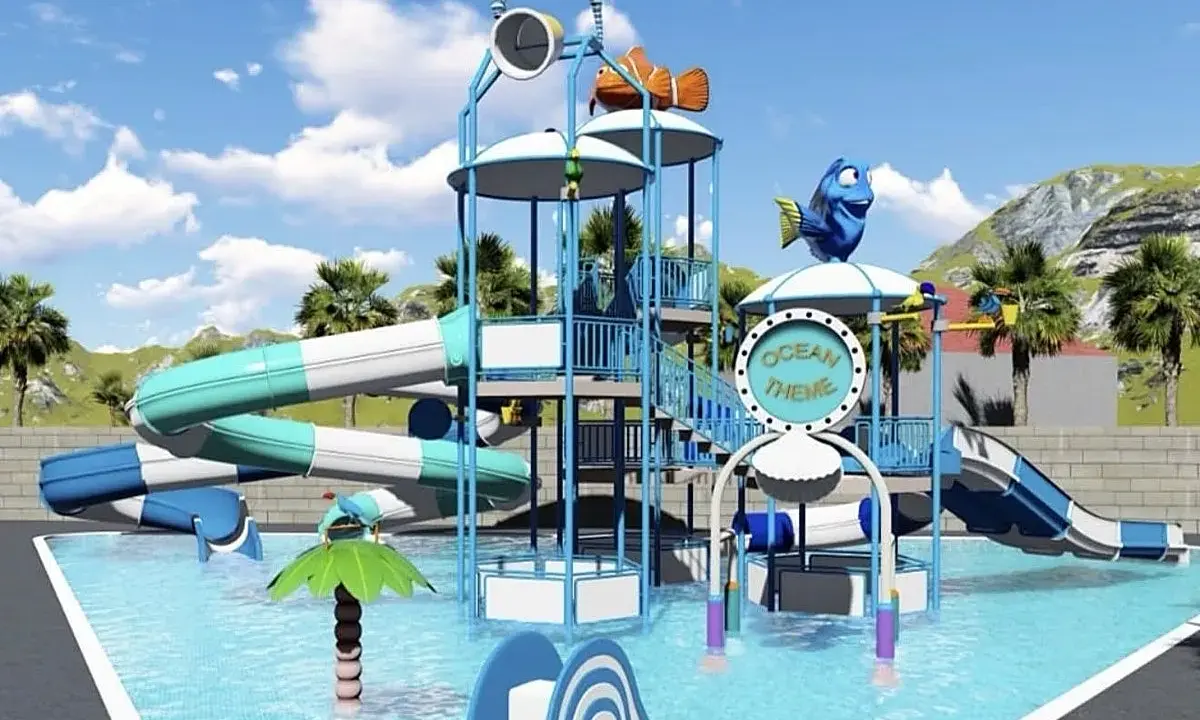 Divertidas piscinas con toboganes para niños, con temática oceánica y personajes de Nemo y Dory.