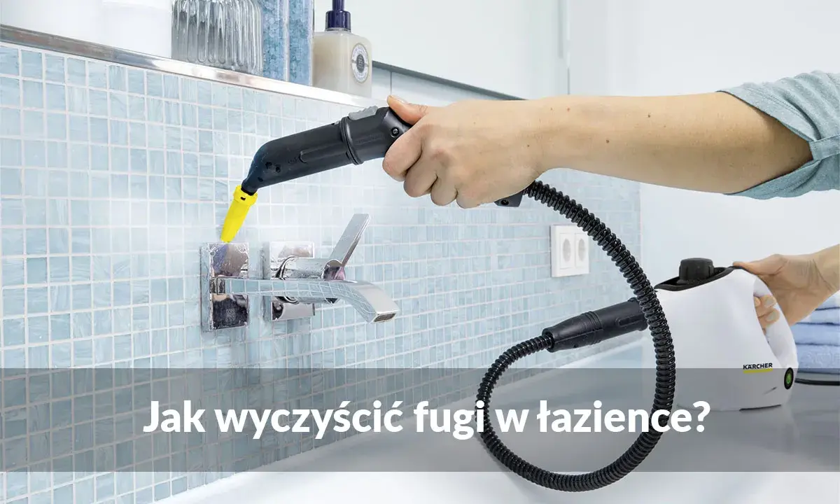 Ręczne mechaniczne czyszczenie fug parownicą Karcher. Para usuwa brud z fug przy baterii łazienkowej.