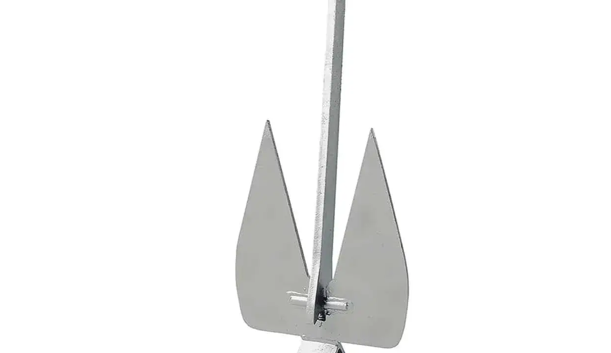 Une ancre de bateau argentée, symbole de stabilité et de sécurité. Son ancre signification est profonde, représentant la permanence.