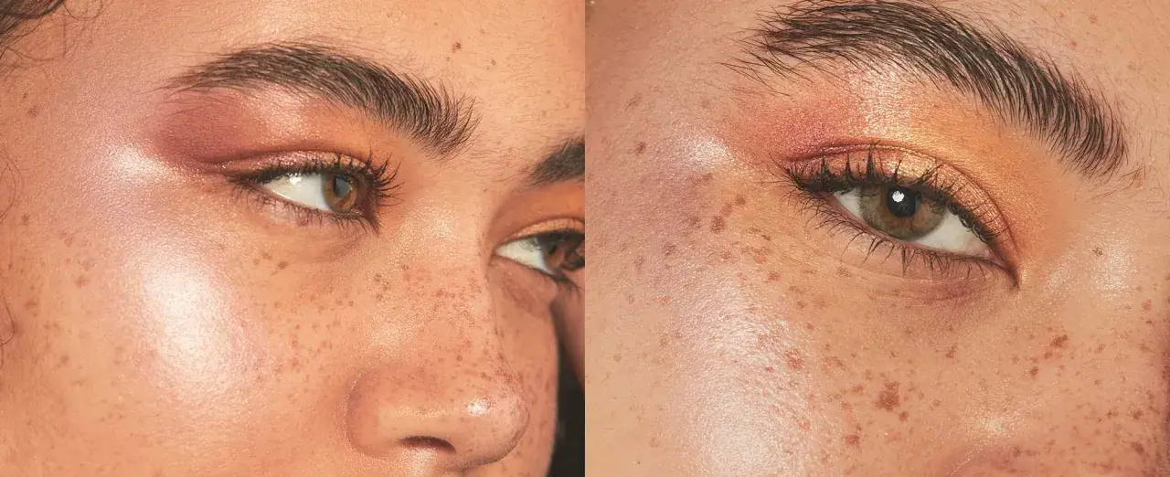 El iluminador se pone después del maquillaje para un brillo natural. Rostro con pecas y maquillaje de ojos cálido.