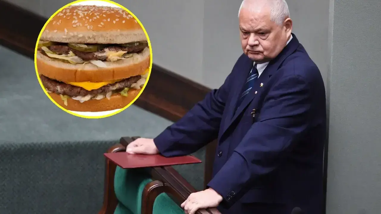 Polityk w garniturze pochyla się nad mównicą, obok widoczny Big Mac. Zastanawia się nad big mac cena?
