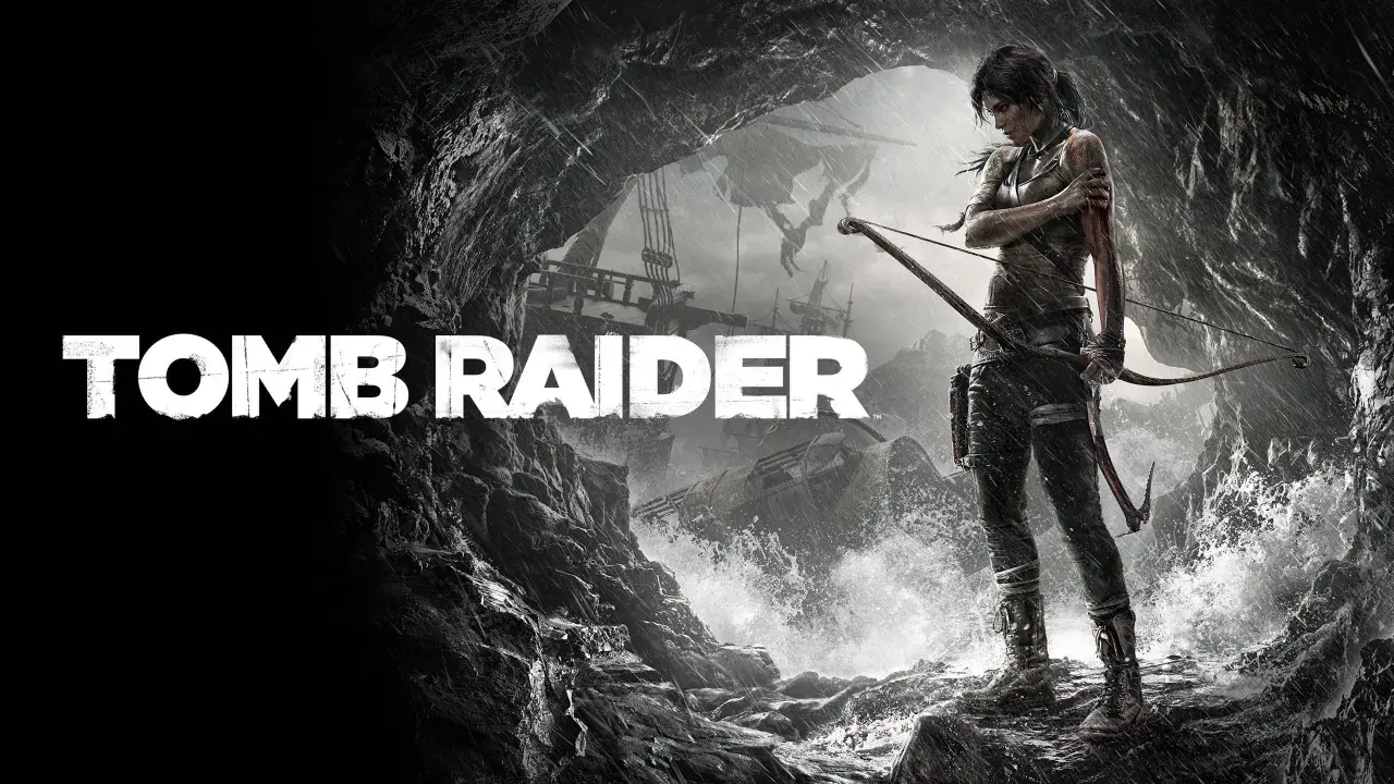 Lara Croft, bohaterka Tomb Raider, stoi na skalistej plaży z łukiem w dłoni, gotowa na przygodę.