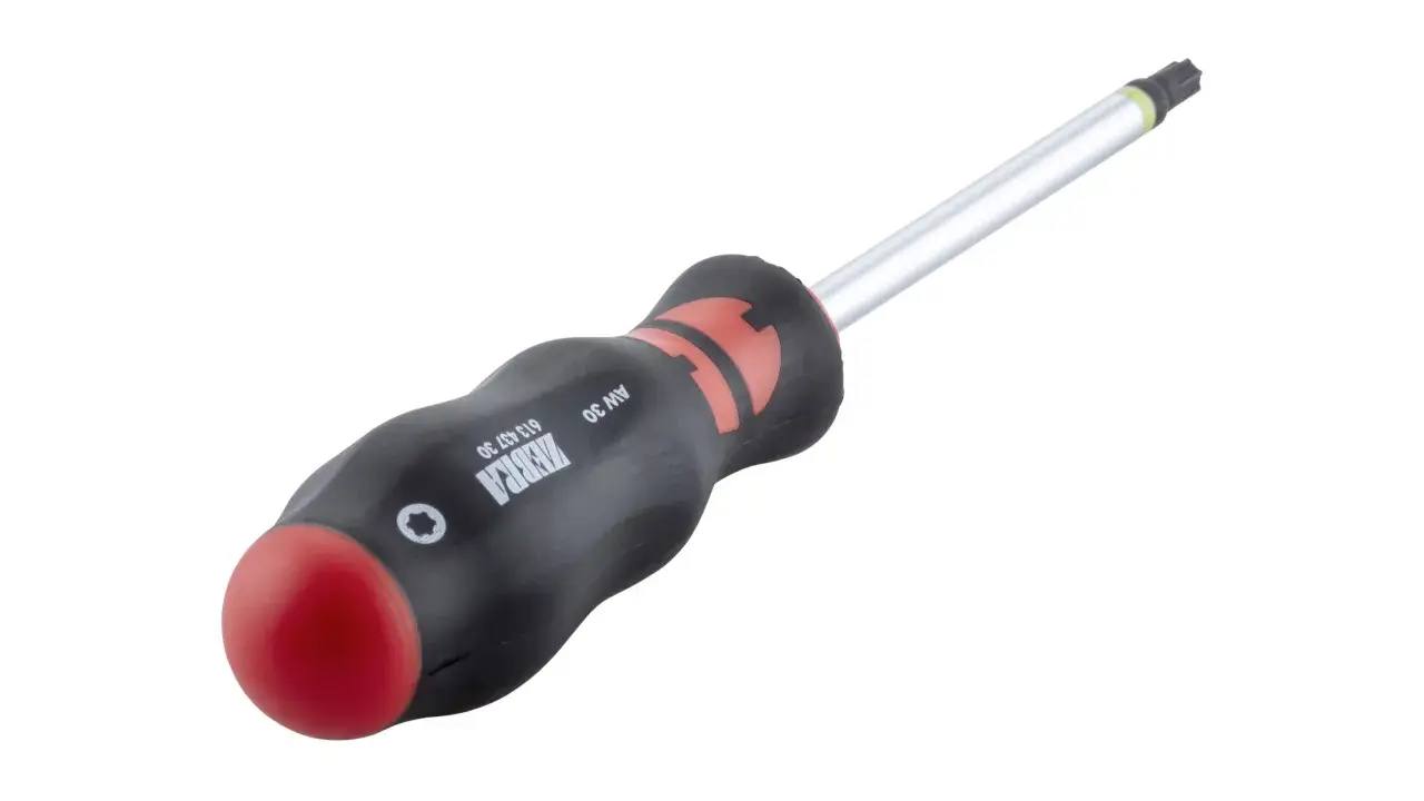 Destornillador Torx con mango ergonómico negro y rojo, parte de los diversos tipos de destornilladores.
