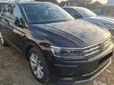 Czarny Volkswagen Tiguan, auto zastępcze z OC sprawcy, stoi na parkingu.