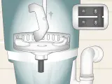 Illustration showing a tool being inserted into a garbage disposal to help unclog it. A switch with "ON" is visible.