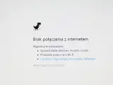 Dinozaur z gry Chrome skacze, bo jest brak internetu. Komunikat "Brak połączenia z internetem" sugeruje sprawdzenie kabli i ponowne połączenie z Wi-Fi.