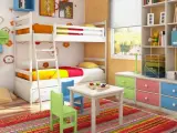 Cameretta bambino 6 anni con letto a castello, scrivania, tappeto colorato e libreria piena di giochi e libri.