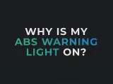 Warum leuchtet mein ABS-Warnlicht? Text auf dunklem Hintergrund.