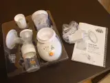 Zestaw laktatora elektrycznego Canpol babies Easystart w opakowaniu, gotowy do użycia.