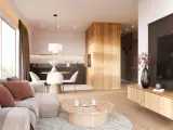 Przytulny salon z sofą, stolikiem kawowym i aneksem kuchennym w stylu japandi. Drewniane elementy i neutralne kolory tworzą harmonijną przestrzeń.