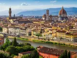 Florence skyline with the Arno River, featuring the Duomo and Palazzo Vecchio, iconic landmarks near the Uffizi Gallery and Accademia.
