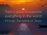 Sunset over a calm lake with a dock. Text reads: "There is power to overcome everything in the world through the name of Jesus.