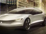 Futurystyczny, biały apple car z podświetlanym logo jabłka, zaparkowany przed nowoczesnymi budynkami w nocy.