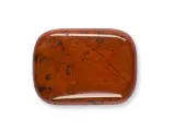 Una piedra de jaspe rojo pulido, con vetas oscuras y manchas, que muestra la belleza natural de que es el jaspe.