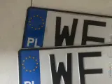 Dwie polskie tablice rejestracyjne z literami "WF" i unijnym symbolem.