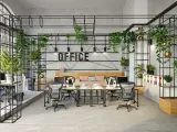 Espace de travail moderne avec beaucoup de plantes, idéal pour une sous location bureaux Paris.