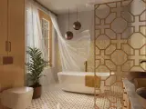 Élégante salle de bain style marocain avec baignoire, double vasque en cuivre, boiseries et carrelage ornemental.